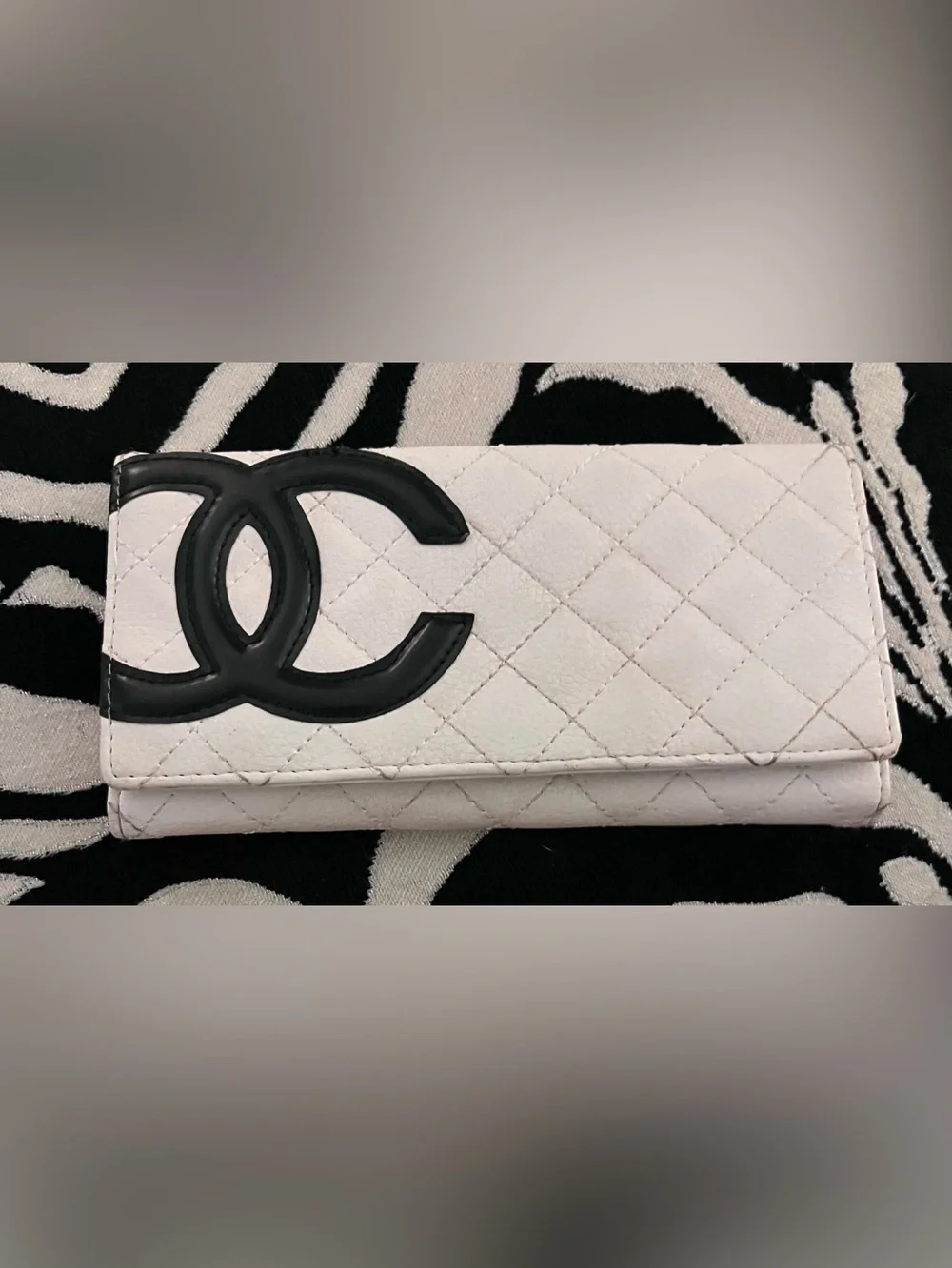 White Quilted Wallet with Black CC logo very nice wallet